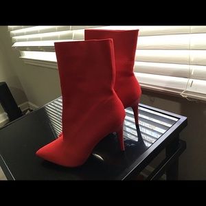 Brash heeled mesh top bootie.